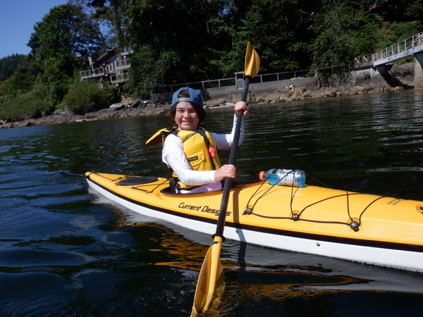 young girl in yellow kayak