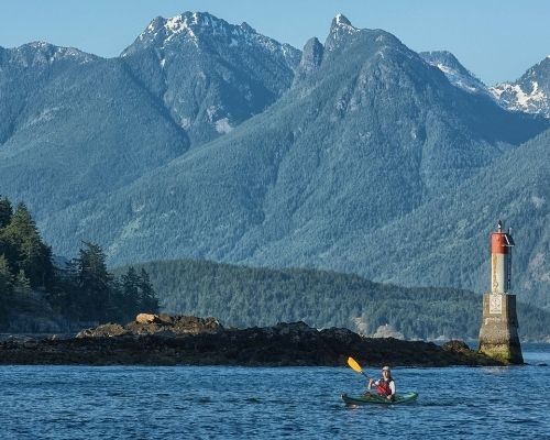 Howe Sound kayaker and lighthouse